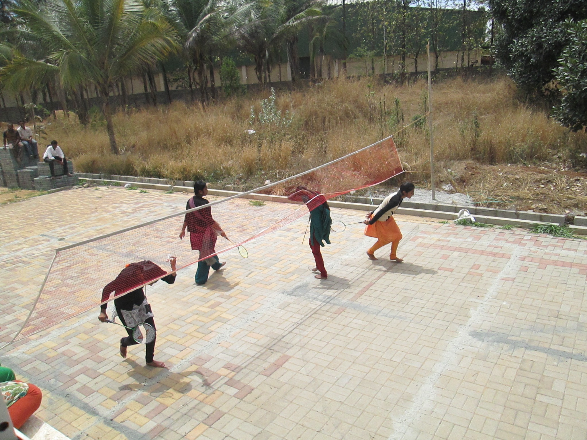 Students participating in volleyball